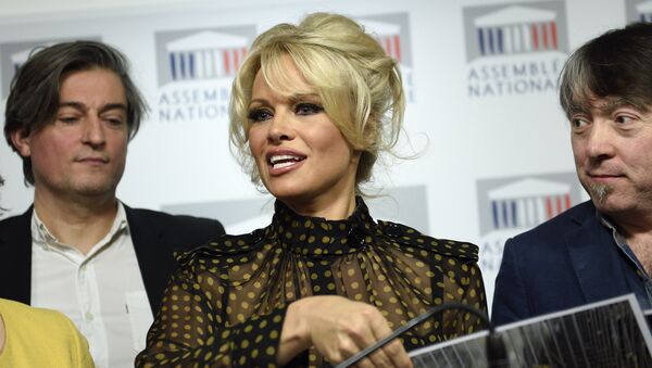 US actress Pamela Anderson gives a press conference after attending a session of questions to the Government at the French National Assembly in Paris on January 19, 2016 - Sputnik International