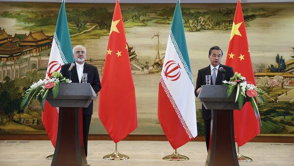 A file photo of China's Foreign Minister Wang Yi (R) and Iranian Foreign Minister Javad Zarif (L) - Sputnik International