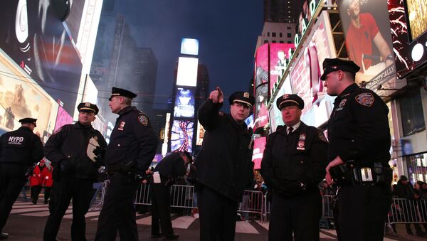 New York City police officers patrol in Times Square ahead of New Years events in New York on December 31, 2015 - Sputnik International