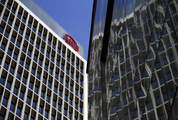 The logo of Asian Infrastructure Investment Bank (AIIB) is seen at its headquarter building in Beijing January 17, 2016 The logo of Asian Infrastructure Investment Bank (AIIB) is seen at its headquarter building in Beijing January 17, 2016 - Sputnik International