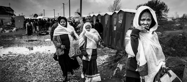 Refugees at the Calais 'Jungle' camp. - Sputnik International