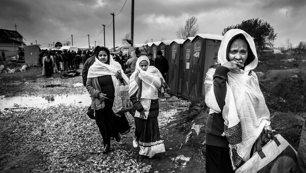 Refugees at the Calais 'Jungle' camp. - Sputnik International