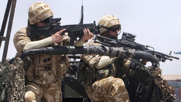 British soldiers stand guard at Umm Qasr port in Basra, Iraq - Sputnik International