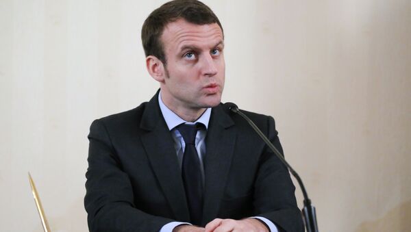 French Economy Minister Emmanuel Macron attends a meeting with the media after a session of the Russian-French Council for economic, financial, industrial and trade issues in Moscow. File photo. - Sputnik International