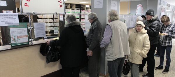 A line at the reception at a district medical center in St.Petersburg during a flu epidemic period. File photo - Sputnik International
