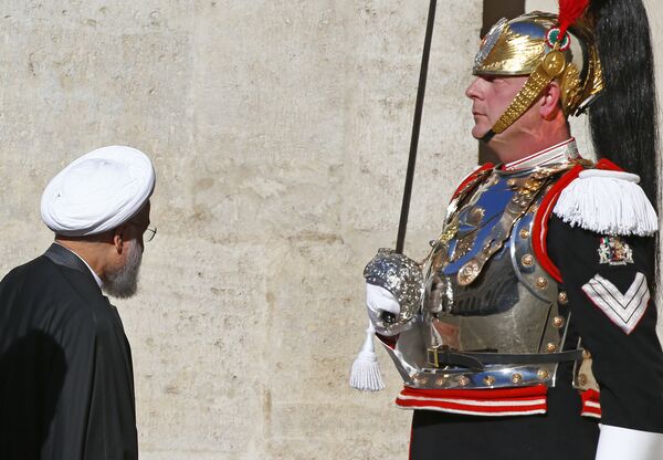 Iran President Hassan Rouhani (L) walks next to the Italian President Sergio Mattarella (unseen) at the Quirinale presidential palace in Rome, Italy, January 25, 2016. Iran President Hassan Rouhani (L) walks next to the Italian President Sergio Mattarella (unseen) at the Quirinale presidential palace in Rome, Italy, January 25, 2016. - Sputnik International