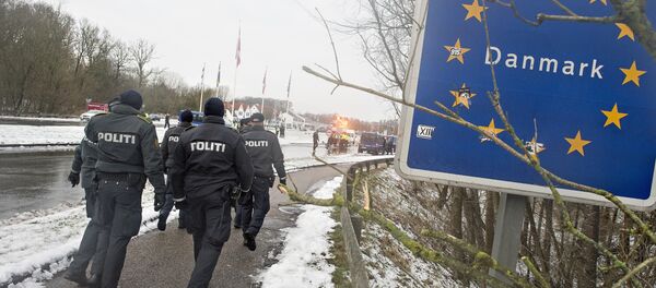 (FILES) This file photo taken on January 09, 2016 shows Danish police officers walking at the Danish-German border on January 9, 2016 in Krusaa, Denmark (FILES) This file photo taken on January 09, 2016 shows Danish police officers walking at the Danish-German border on January 9, 2016 in Krusaa, Denmark - Sputnik International