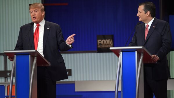 Republican Presidential candidate businessman Donald Trump (L) speaks next to Texas Senator Ted Cruz during the Republican Presidential debate sponsored by Fox Business and the Republican National Committee at the North Charleston Coliseum and Performing Arts Center in Charleston, South Carolina on January 14, 2016 - Sputnik International