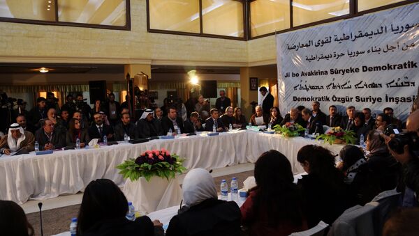 A picture taken on December 8, 2015 shows a general view of the two-day Syrian Democratic Conference in Al-Malikiyeh, a town in Syria's northeastern Hasakeh province, held by Kurdish factions to discuss a vision for Syria's future. Dozens of Kurdish, Arab, and Assyrian figures attended the conference including members of Syria's leading Kurdish movement, the Democratic Union Party (PYD), - Sputnik International