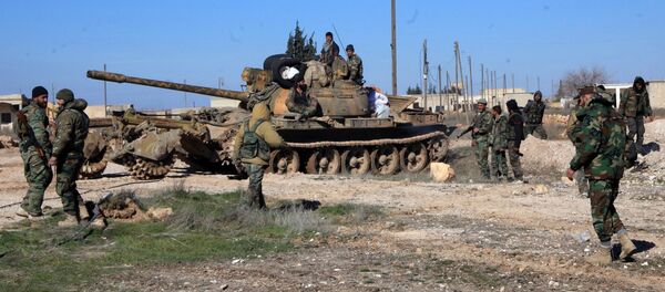 Syrian pro-government troops hold positions in the Syrian town of Ain al-Hanash near l-Bab in Aleppo's eastern countryside on January 26, 2015 as regime forces have recaptured the area from Islamist jihadists Syrian pro-government troops hold positions in the Syrian town of Ain al-Hanash near l-Bab in Aleppo's eastern countryside on January 26, 2015 as regime forces have recaptured the area from Islamist jihadists - Sputnik International