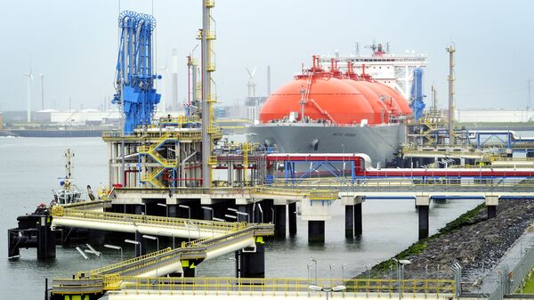 The LNG carrier, a tank ship designed for transporting liquefied natural gas, Arctic Voyager is setting for sail in the port of Rotterdam, The Netherlands on July 6, 2011 - Sputnik International