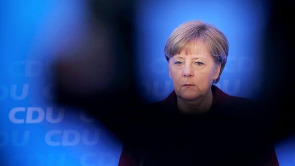 German chancellor Angela Merkel speaks during a press conference after a meeting with leading politicians at her CDU party in Mayence, central Germany, on January 9, 2016 - Sputnik International