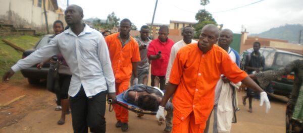 Cameroon Medics evacuate the body (File) Cameroon Medics evacuate the body (File) - Sputnik International