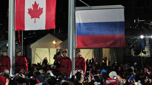 Canadian and  Russian flags - Sputnik International