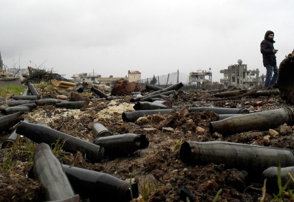 A picture taken on January 26, 2016 shows artillery casings on the ground after Syrian pro-government forces retook the town of Sheikh Miskeen in southern Daraa province from rebel forces A picture taken on January 26, 2016 shows artillery casings on the ground after Syrian pro-government forces retook the town of Sheikh Miskeen in southern Daraa province from rebel forces - Sputnik International