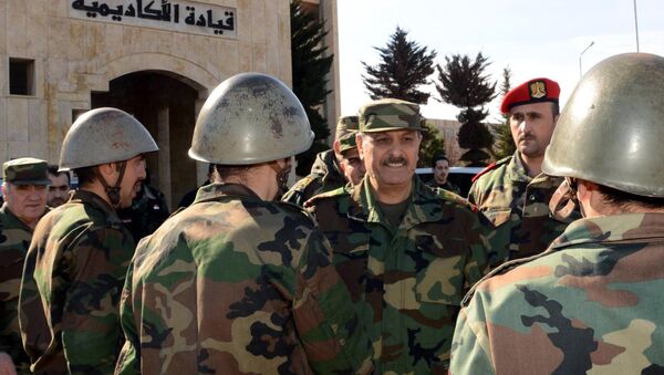 Syria's General Fahd Jassem al-Freij (C), Deputy Commander-in-Chief of the Army and the Armed Forces and Minister of Defense allegedly visiting troops in the northern Syrian city of Aleppo. (File) - Sputnik International