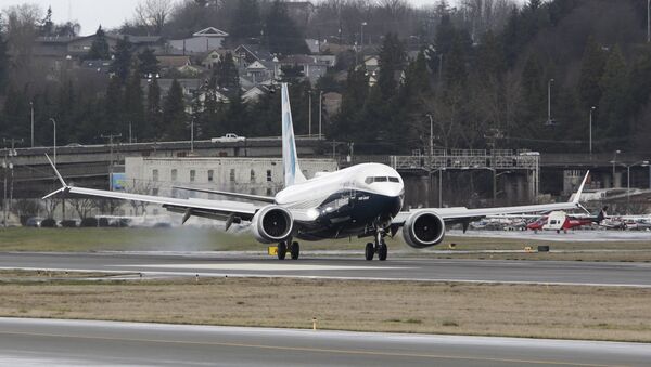 A Boeing 737 MAX returns from a flight test at Boeing Field in Seattle, Washington - Sputnik International