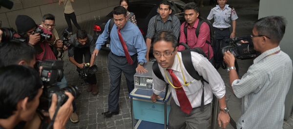 File Photo: Malaysian police seize equipment from the 1Malaysia Development Berhad (1MDB) office in Kuala Lumpur on July 8, 2015 File Photo: Malaysian police seize equipment from the 1Malaysia Development Berhad (1MDB) office in Kuala Lumpur on July 8, 2015 - Sputnik International