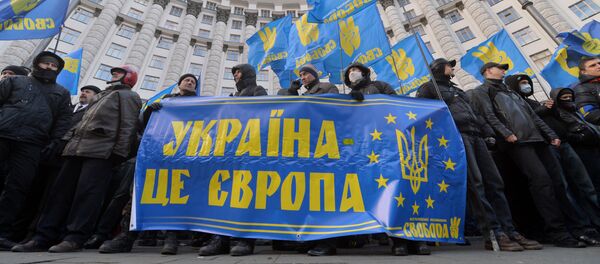 Protesters hold a placards reading Ukraine is Europe Protesters hold a placards reading Ukraine is Europe - Sputnik International