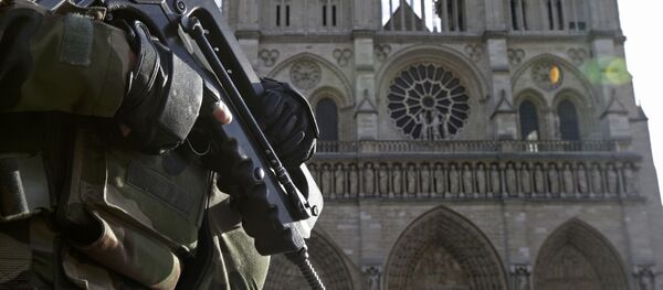 An armed French soldier patrols in front of Notre Dame Cathedral in Paris, France, in this picture taken on December 24, 2015, as a security alert continued following the November shooting attacks in the French capital. Thousands of demonstrators marched in France January 30, 2016 to protest against the government's plans to extend the state of emergency in the country. Picture taken December 24, 2015. An armed French soldier patrols in front of Notre Dame Cathedral in Paris, France, in this picture taken on December 24, 2015, as a security alert continued following the November shooting attacks in the French capital. Thousands of demonstrators marched in France January 30, 2016 to protest against the government's plans to extend the state of emergency in the country. Picture taken December 24, 2015. - Sputnik International