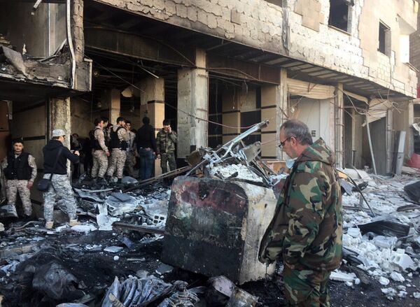 Aftermath of a double terrorist attack in the Shia district of Sayyidah Zaynab in Damascus Aftermath of a double terrorist attack in the Shia district of Sayyidah Zaynab in Damascus - Sputnik International