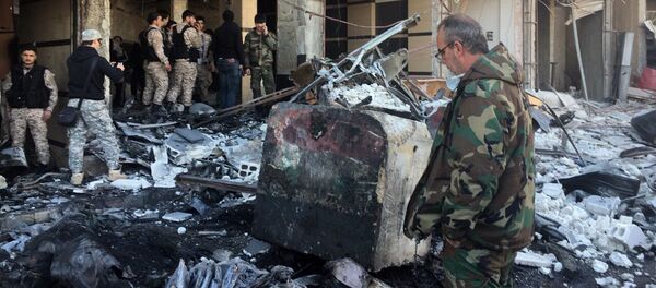 Aftermath of a double terrorist attack in the Shia district of Sayyidah Zaynab in Damascus Aftermath of a double terrorist attack in the Shia district of Sayyidah Zaynab in Damascus - Sputnik International