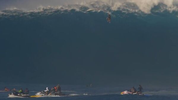 Surfer Drops 40 Feet. - Sputnik International