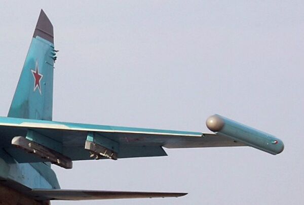 The relatively small container in the shape of a torpedo is mounted on the wingtips of the aircraft. The relatively small container in the shape of a torpedo is mounted on the wingtips of the aircraft. - Sputnik International