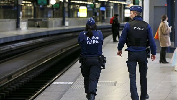 Belgian police officers patrol on a platform at the Thalys high-speed train terminal at Midi/Zuid railway station in Brussels, Belgium, January 7, 2016 - Sputnik International