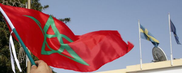 Moroccan woman waves her national flag outside the Swedish Embassy in Rabat, Morocco, as hundreds of protesters stage a protest against Sweden’s diplomatic position on Moroccan-controlled Western Sahara, Sunday, Oct. 4, 2015 Moroccan woman waves her national flag outside the Swedish Embassy in Rabat, Morocco, as hundreds of protesters stage a protest against Sweden’s diplomatic position on Moroccan-controlled Western Sahara, Sunday, Oct. 4, 2015 - Sputnik International