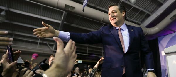 Republican presidential candidate, Sen. Ted Cruz, R-Texas, greets supporters during a caucus night rally, Monday, Feb. 1, 2016, in Des Moines, Iowa Republican presidential candidate, Sen. Ted Cruz, R-Texas, greets supporters during a caucus night rally, Monday, Feb. 1, 2016, in Des Moines, Iowa - Sputnik International