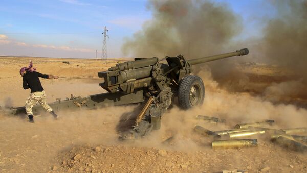 In this photo taken on Saturday, Jan. 30, 2016, Syrian government troops fire at Islamic State group positions near Mahin, Syria - Sputnik International
