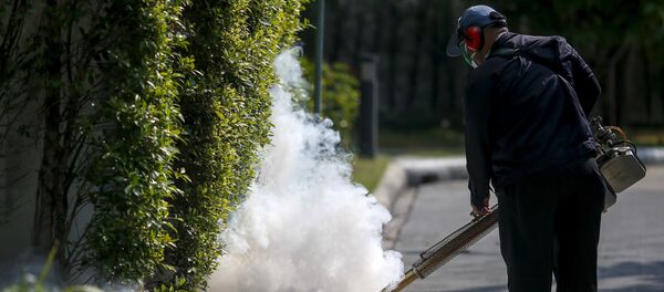 A worker sprays insecticide for mosquitos at a village in Bangkok, Thailand, January 13, 2016 A worker sprays insecticide for mosquitos at a village in Bangkok, Thailand, January 13, 2016 - Sputnik International