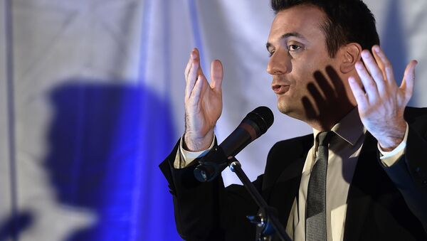 Florian Philippot, French far-right Front National (FN) party vice-president and top candidate for the December regional elections in the eastern Alsace-Champagne-Ardenne-Lorraine region, delivers a speech during a campaign meeting in Kintzheim, eastern France, on December 9, 2015 - Sputnik International