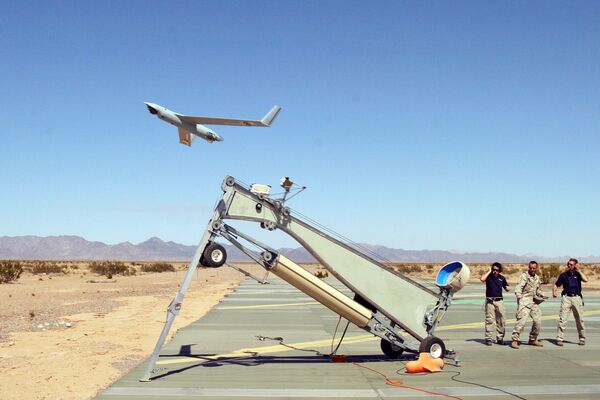 US Marine Corps Sergeant Michael Kropiewnicki (C), a Combat Videographer with 2nd Marine Aircraft Wing (MAW) Combat Camera, launching a Boeing Scan Eagle Unmanned Aerial Vehicle (UAV)(File) US Marine Corps Sergeant Michael Kropiewnicki (C), a Combat Videographer with 2nd Marine Aircraft Wing (MAW) Combat Camera, launching a Boeing Scan Eagle Unmanned Aerial Vehicle (UAV)(File) - Sputnik International
