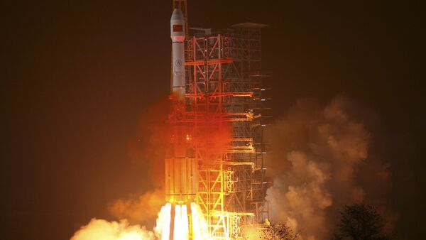 In this photo released by the Xinhua news agency, an orbiter is launched by a Long March-3III carrier rocket from the Xichang Satellite Launch Center in southwest China's Sichuan Province, on Sunday Jan. 17, 2010 - Sputnik International
