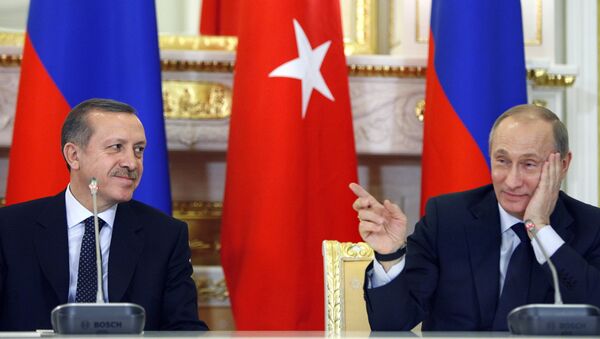 Russian Prime Minister Vladimir Putin, right, gestures as Turkish Prime Minister Recep Tayyip Erdogan listens to him on during a joint press conference with in Moscow, Russia, Wednesday, Jan. 13, 2010 - Sputnik International
