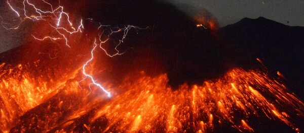 Volcanic lightning is seen at an eruption of Mount Sakurajima, in this photo taken from Tarumizu city, Kagoshima prefecture, southwestern Japan, in this photo taken by Kyodo February 5, 2016 - Sputnik International