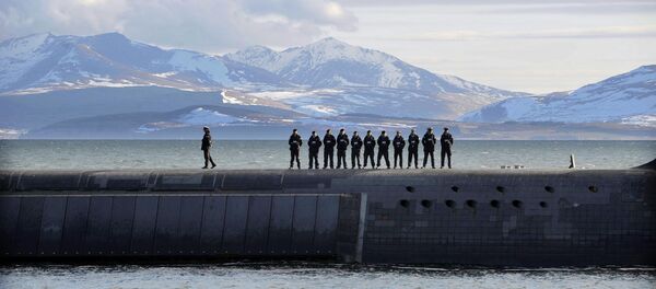 British Navy personnel stand atop the Trident Nuclear Submarine, HMS Victorious, on patrol off the west coast of Scotland on April 4, 2013 before the visit of British Prime Minister David Cameron. - Sputnik International