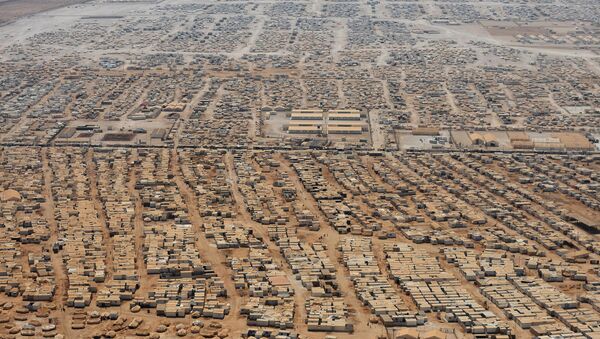 FILE - This Thursday, July 18, 2013 aerial view photo, shows the Zaatari refugee camp near the Jordanian city of Mafraq, some 8 kilometers (5 miles) from the Jordanian-Syrian border - Sputnik International