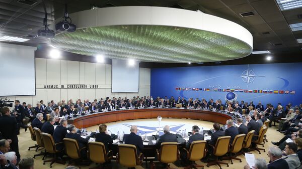 A general view of the table for a meeting of the NATO-Russia Council at the level of defense ministers at NATO headquarters in Brussels. File photo - Sputnik International