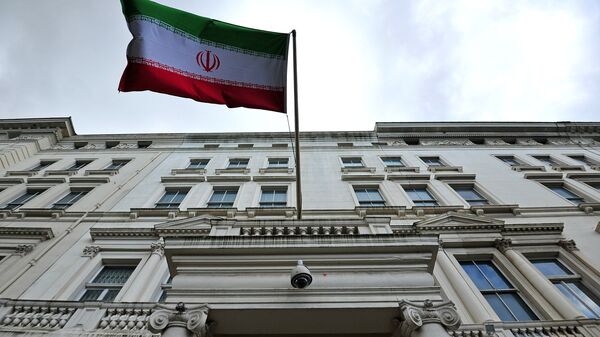 The Iranian flag hangs outside the Iranian embassy in central London on February 20, 2014 - Sputnik International