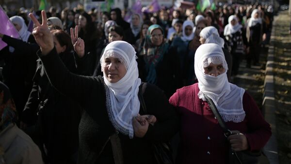 Women march during a protest denouncing violence, in Diyarbakir, Turkey, Friday, Dec. 25, 2015. (File) - Sputnik International