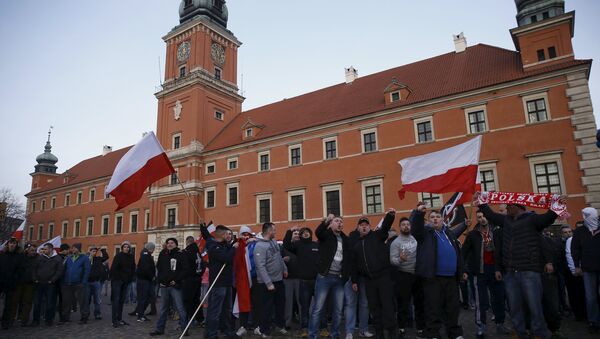 Protesters shout slogans during anti-immigrant rally in front of the Royal Castle in Warsaw, Poland February 6, 2016. - Sputnik International