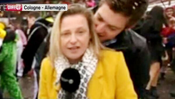 A screenshot of RTBF journalist Esmeralda Labye being groped in front of a live camera at Carnival in Cologne - Sputnik International