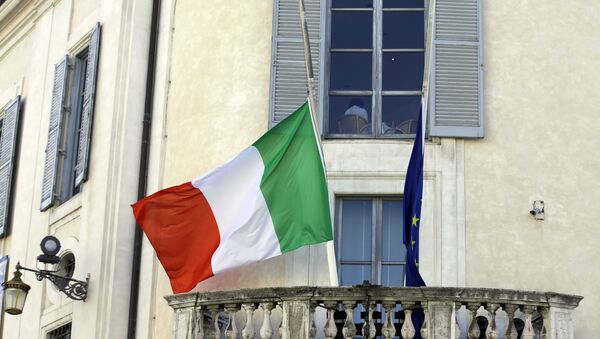 The Italian, left, and European Union flags wave at half mast on the facade of the Scuderie del Quirinale museum in Rome. - Sputnik International