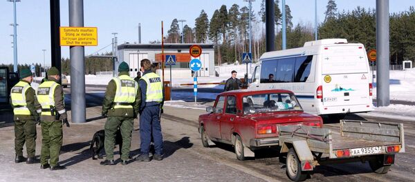 Picture taken 09 March 2005 shows a Russian registered car arriving at customs at the Pelkola international Border and Customs Station in Imatra, south-east Finland on the Finnish-Russian border Picture taken 09 March 2005 shows a Russian registered car arriving at customs at the Pelkola international Border and Customs Station in Imatra, south-east Finland on the Finnish-Russian border - Sputnik International