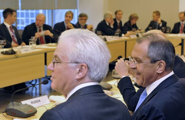 From right: Russian Foreign Minister Sergei Lavrov and Vitaly Churkin, Russian ambassador to the UN, at a meeting with 27 EU foreign ministers during the 63rd UN General Assembly session in New York - Sputnik International