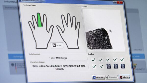 A fingerprint of a refugee is seen on a computer screen at the migrants registration center of the Patrick-Henry Village refugee center in Heidelberg, Germany January 28, 2016. - Sputnik International