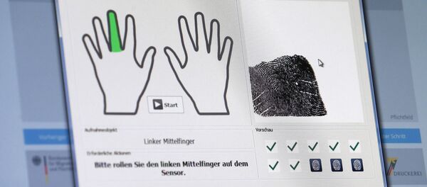 A fingerprint of a refugee is seen on a computer screen at the migrants registration center of the Patrick-Henry Village refugee center in Heidelberg, Germany January 28, 2016. A fingerprint of a refugee is seen on a computer screen at the migrants registration center of the Patrick-Henry Village refugee center in Heidelberg, Germany January 28, 2016. - Sputnik International